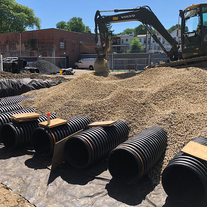 St. Vincent of De Paul Stormwater Management - Endwall with Gabions Entering Foreway | TPEC